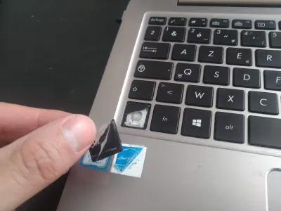 How Long Do Laptops Last? : Laptop repaired with tape to make it last longer than 4 years